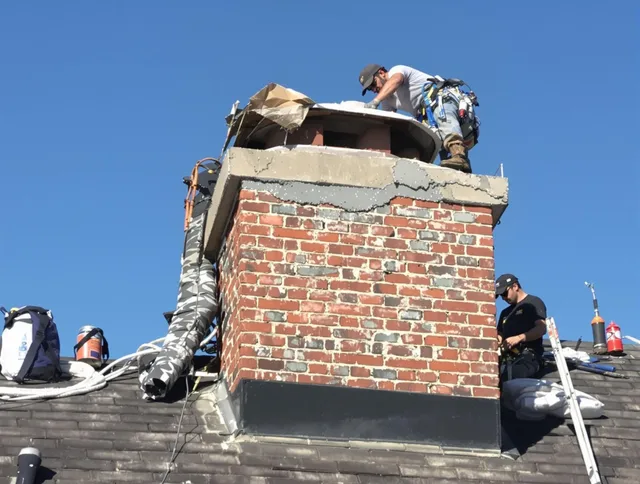Colton Chimney Sweep installing a custom chimney crown in Colton, CA
